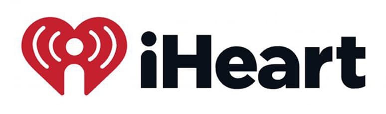 The iHeart logo features a red heart with radio signals and a lowercase "i" inside, next to the word "iHeart" in bold black letters.